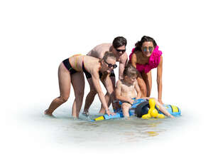 cut out family having fun on the beach