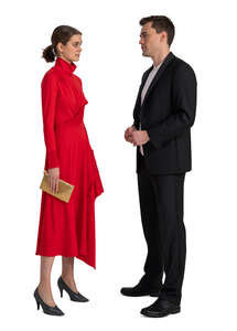 cut out woman in a red dress talking to a man in a suit