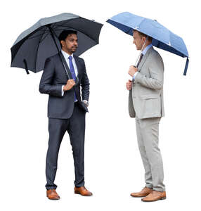 two cut out businessmen with umbrellas standing and talking