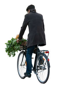 cut out man riding a bike home from groceries shopping