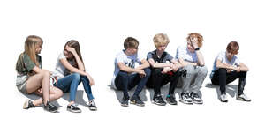 cut out group of kids sitting and chatting