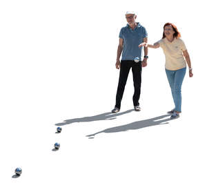 two cut out seniors playing petanque