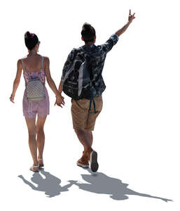 cut out backlit couple walking hand in hand