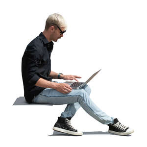 cut out man with a laptop sitting and working