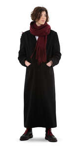 cut out woman in a long black overcoat standing