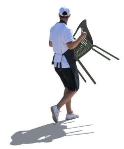 cut out backlit waiter carrying restaurant chairs