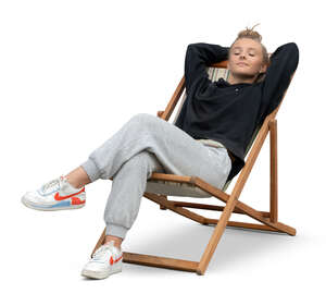 cut out teenage girl relaxing in the garden chair