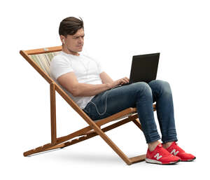 cut out man sitting in a garden chair with a laptop