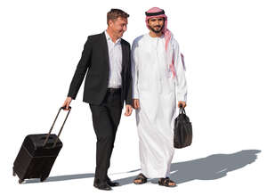 businessman and emirati man with suitcases walking