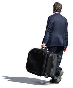 businessman carrying a big suitcase