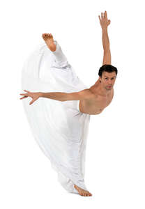 cut out ballet dancer with a white skirt performing