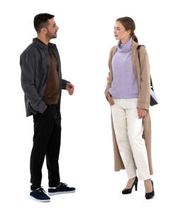 two cut out people wearing light jackets standing and talking