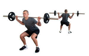 man doing squats with weights in a gym with mirror reflection