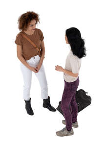two cut out women standing and talking seen from above