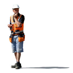 worker with an helmet standing and thinking