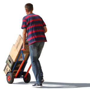 man pushing boxes on hand truck