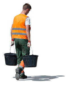 construction worker with buckets walking