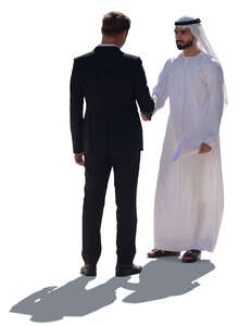 businessman shaking hans with an arab man