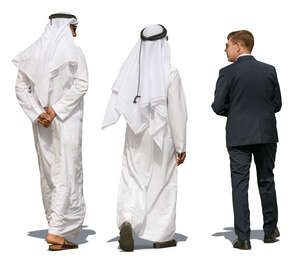 arab men walking and talking to an european businessman