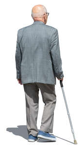 old man in a grey suit walking