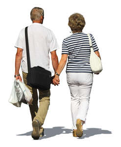 older couple walking hand in hand