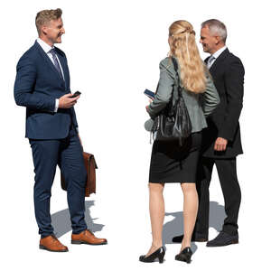 three cut out businesspeople standing and talking