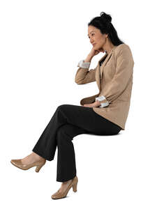 cut out asian woman sitting at a table