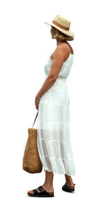 cut out woman in a white summer dress standing