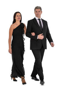 cut out couple in formal party clothes walking arm in arm