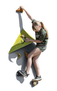 cut out girl climbing on a climbing wall