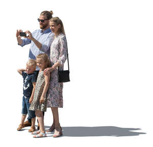 cut out family standing together and taking pictures