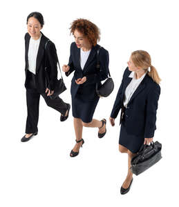 cut out top view of three businesswomen walking