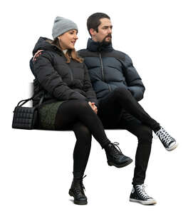 cut out couple in winter sitting together