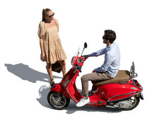 top view of a man on a vespa scooter talking to a woman
