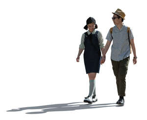 cut out asian backlit couple walking hand in hand