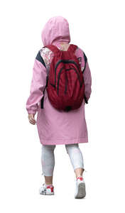 cut out woman wearing a pink rain jacket walking