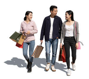 cut out group of three asian people with shopping bags walking