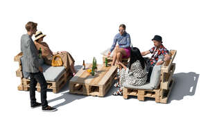 cut out group of young people hanging in a bohemian outdoor cafe