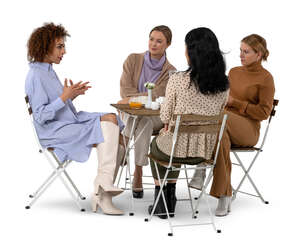 cut out women sitting in a cafe and talking