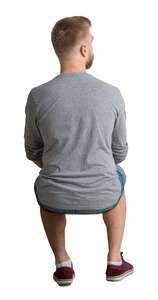 cut out man sitting seen from behind