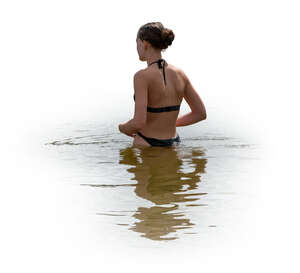 cut out woman going swimming at the beach