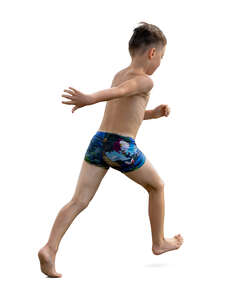 cut out little boy running at the beach