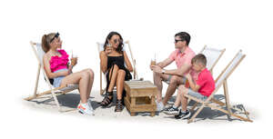cut out family relaxing in the beach cafe