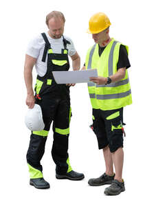 two cut out construction workers reading work plans