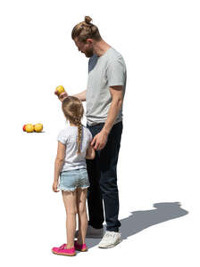 cut out father and daughter picking apples at farmers market