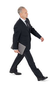 cut out middle aged businessman walking seen from above