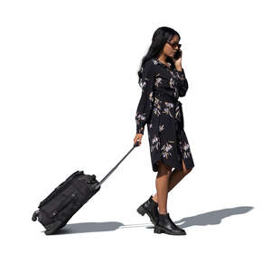 cut out woman with a suitcase walking