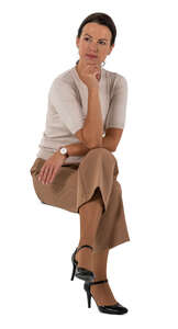 cut out woman in beige clothing sitting
