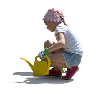 cut out little backlit girl with a watering can swuatting in the garden
