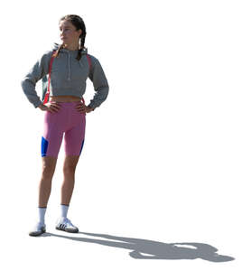 cut out backlit sporty woman standing